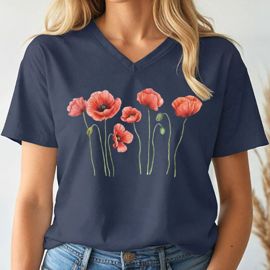 Navy blue v-neck t-shirt with red floral poppy design worn by a person
