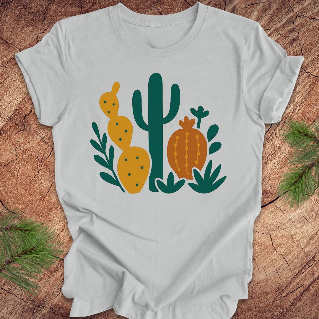 Gray t-shirt with cactus design on a wooden surface