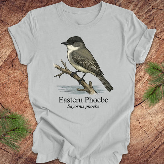Gray t-shirt with an illustration of an Eastern Phoebe bird on a wooden surface.