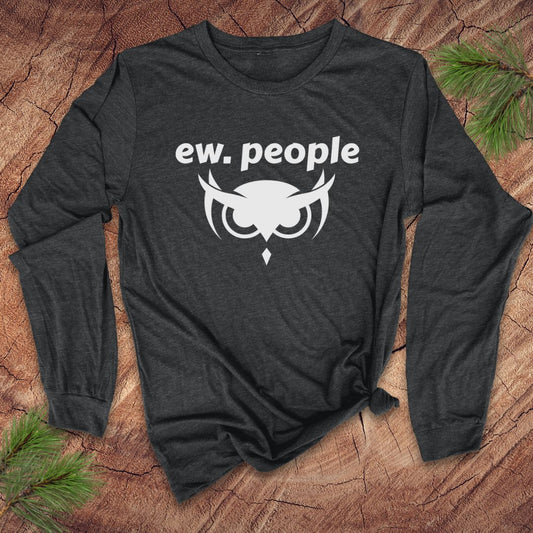 Black long-sleeve shirt with 'ew. people' text and owl graphic on a wooden surface.