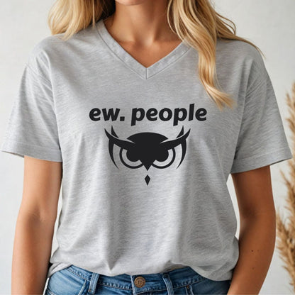 Person wearing a gray v-neck t-shirt with 'ew. people' and an owl graphic design.