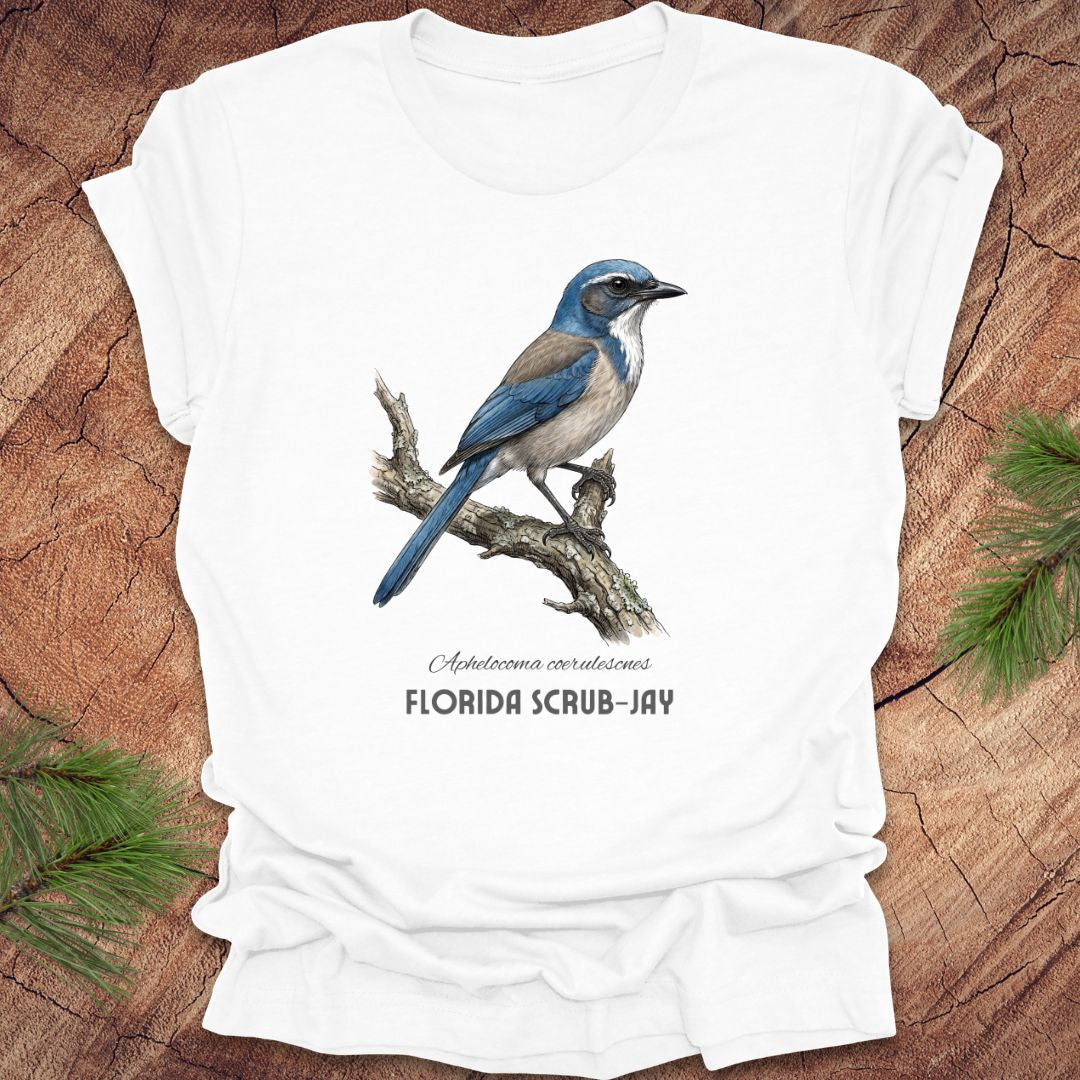 White t-shirt with Florida Scrub-Jay design on a wooden surface