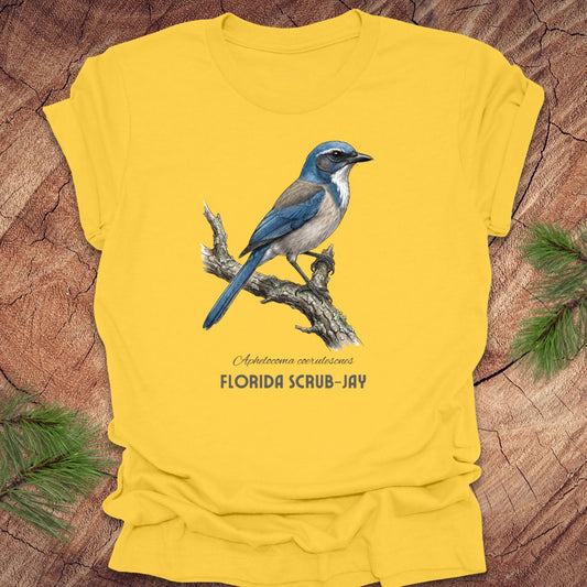 Yellow t-shirt with a Florida Scrub-Jay design on a wooden background