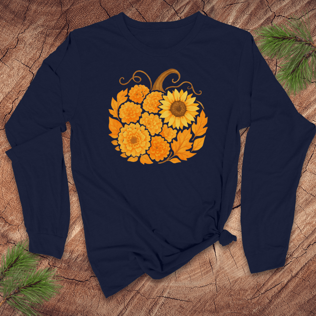 Navy blue long-sleeve shirt with a sunflower pumpkin design on a wooden surface.