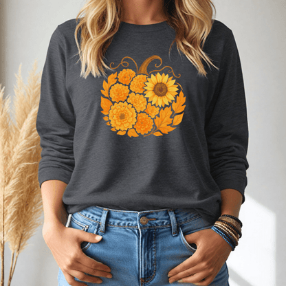 Person wearing a dark gray long sleeve tshirt with a pumpkin sunflower design, standing against a neutral background.