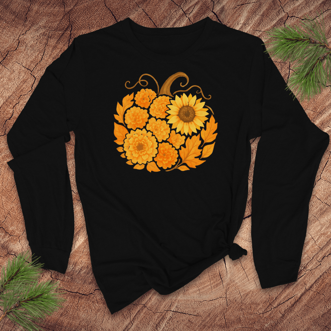Black long sleeve tshirt with a sunflower pumpkin design on a wooden surface.