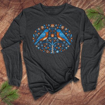 Dark gray long-sleeve shirt with a colorful design of two birds and a tree on a wooden surface.
