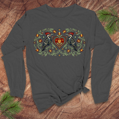 Dark gray long-sleeve shirt with nature-themed design featuring two birds and a heart on a wooden surface.