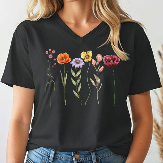 Black t-shirt with colorful floral design worn by a person