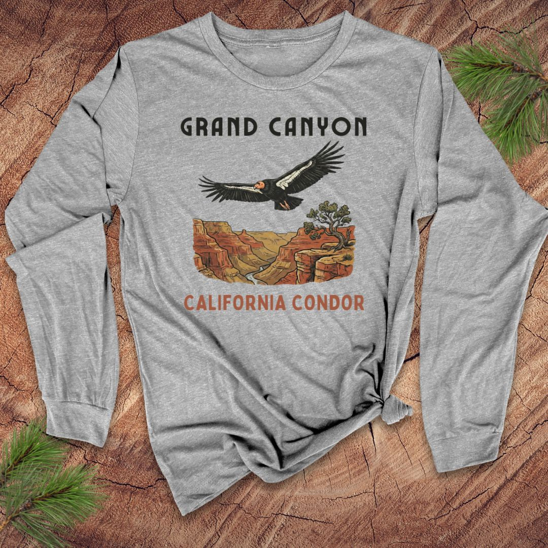 Gray long-sleeve shirt with Grand Canyon and California Condor design on a wooden surface.