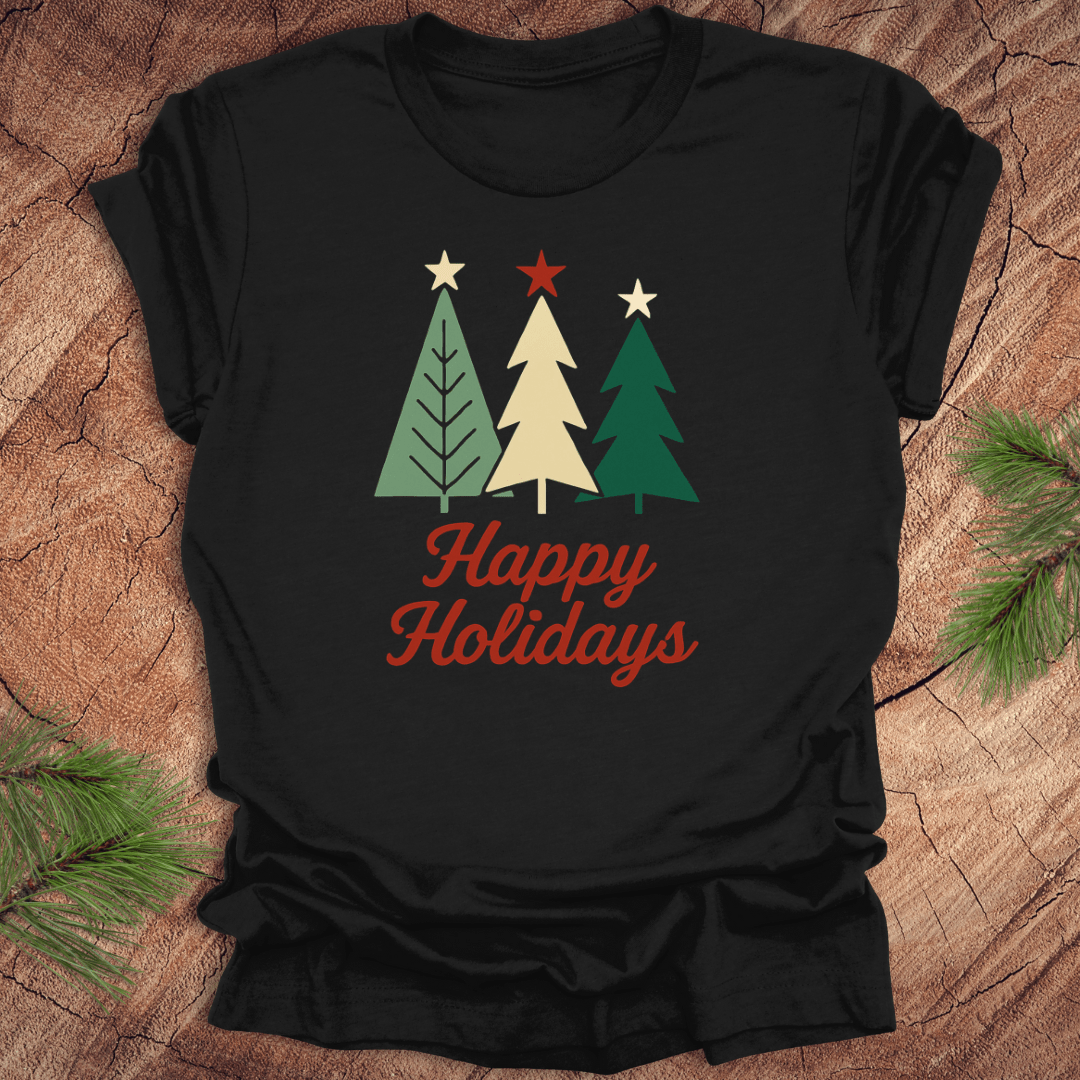Black t-shirt with Christmas tree design and 'Happy Holidays' text on a wooden surface.