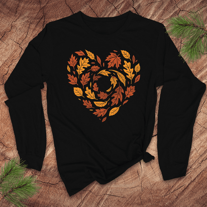 Black long sleeve tshirt with autumn leaf design in the shape of a heart on a wooden surface