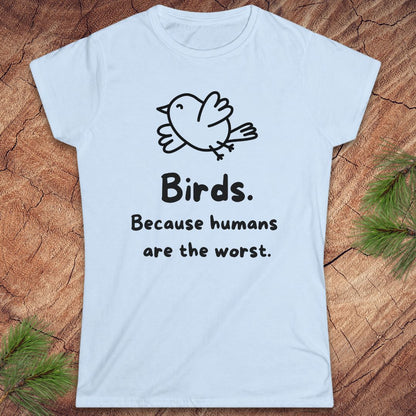 A light blue short-sleeve t-shirt with a black graphic of a bird and the text 'Birds. Because humans are the worst.