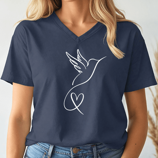 Navy blue v-neck t-shirt with a hummingbird and heart design worn by a person.