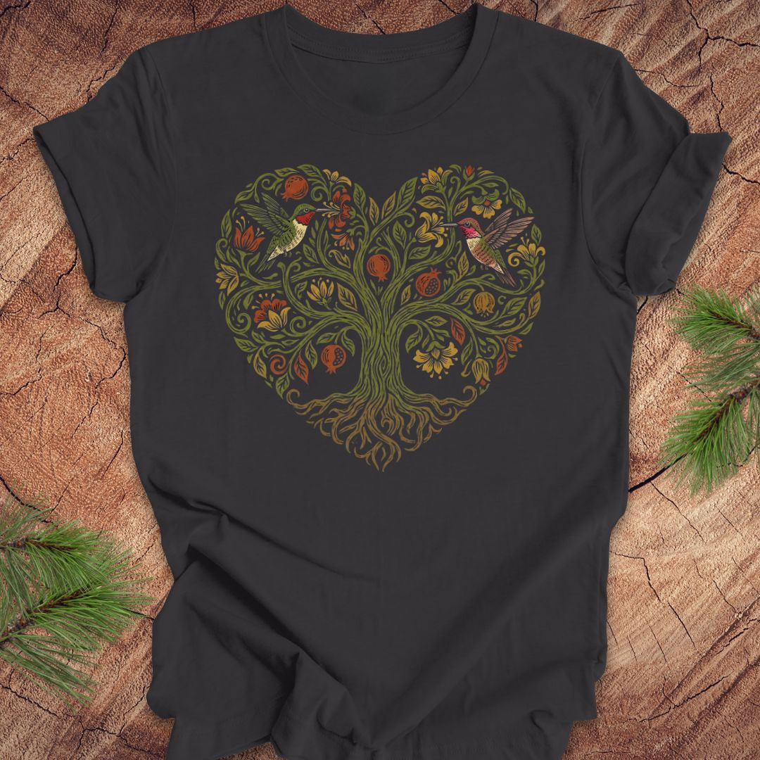 Dark gray t-shirt with a heart-shaped tree design featuring hummingbirds on a wooden surface.