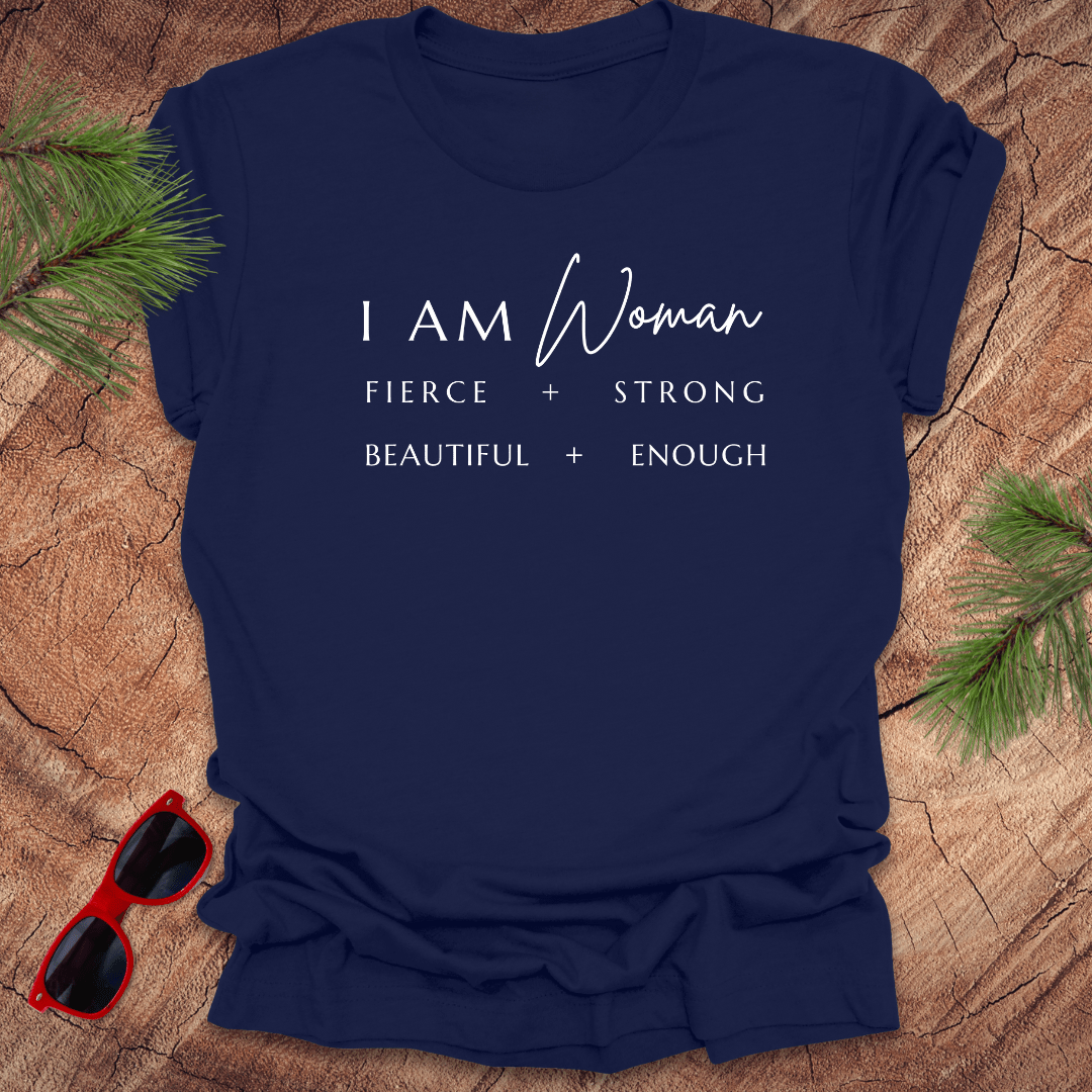 A navy-colored unisex short-sleeve t-shirt with the text 'I AM Woman Fierce. Strong. Beautiful. Enough.' printed in white.