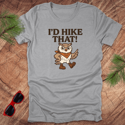 A gray t-shirt with a graphic of an owl wearing a hat and the text 'I'D HIKE THAT!' printed above.