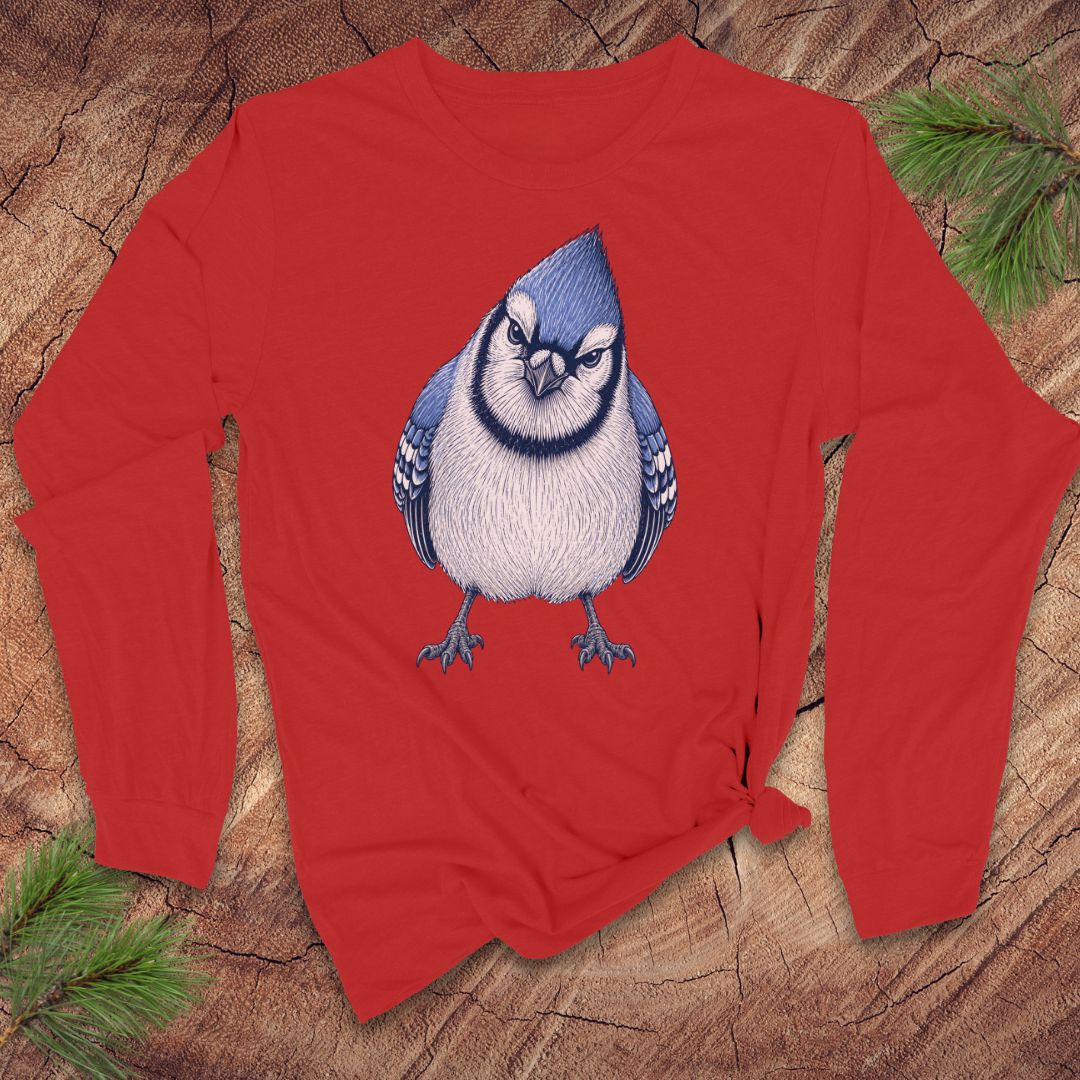 Red long-sleeve t-shirt with a blue jay design on a wood background.