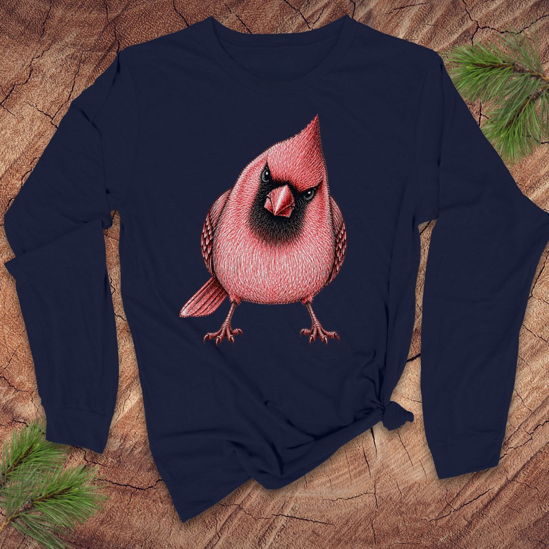 Navy blue long-sleeve shirt with a red cardinal bird design on a wooden surface.