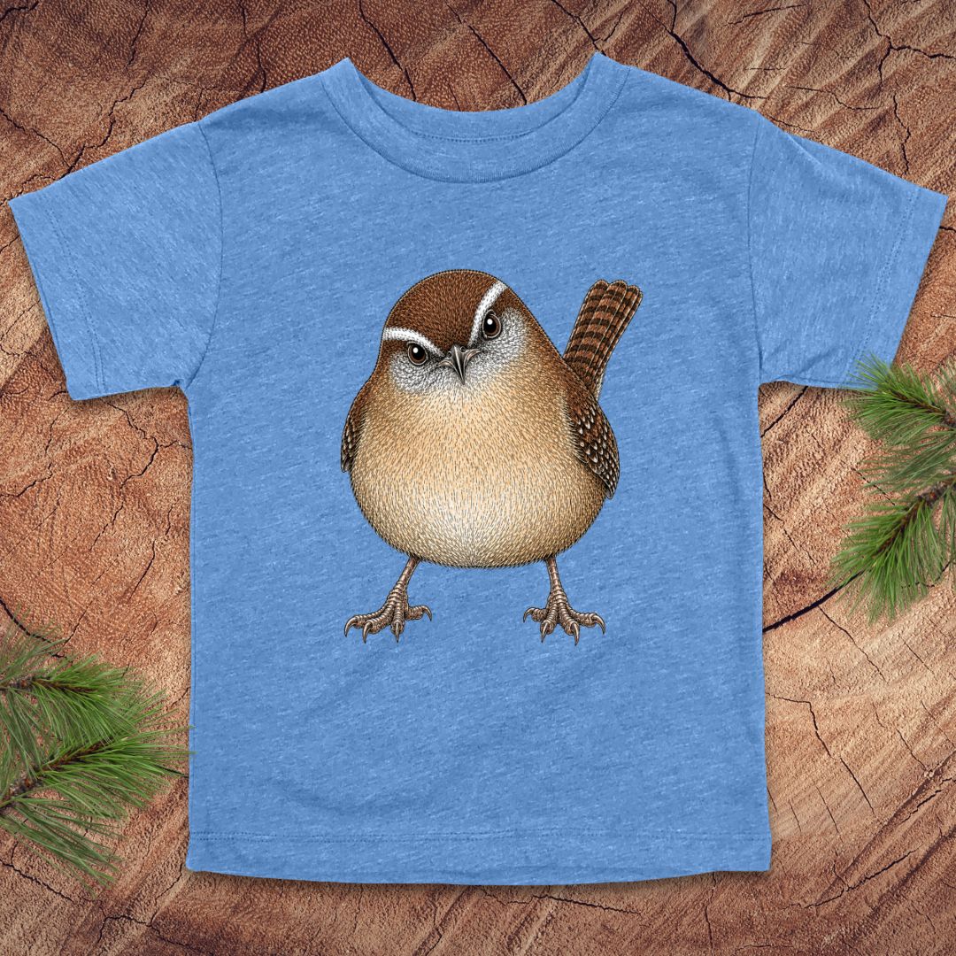 Blue toddler t-shirt with a carolina wren design on a wooden surface
