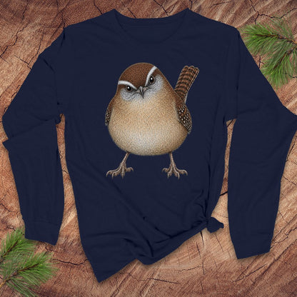 Navy blue long-sleeve t-shirt with a carolina wren design on a wood background.