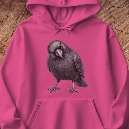 Heliconia pink hoodie with a detailed pencil-style American Crow tilting its head and glaring, laid flat on a rustic wood background.