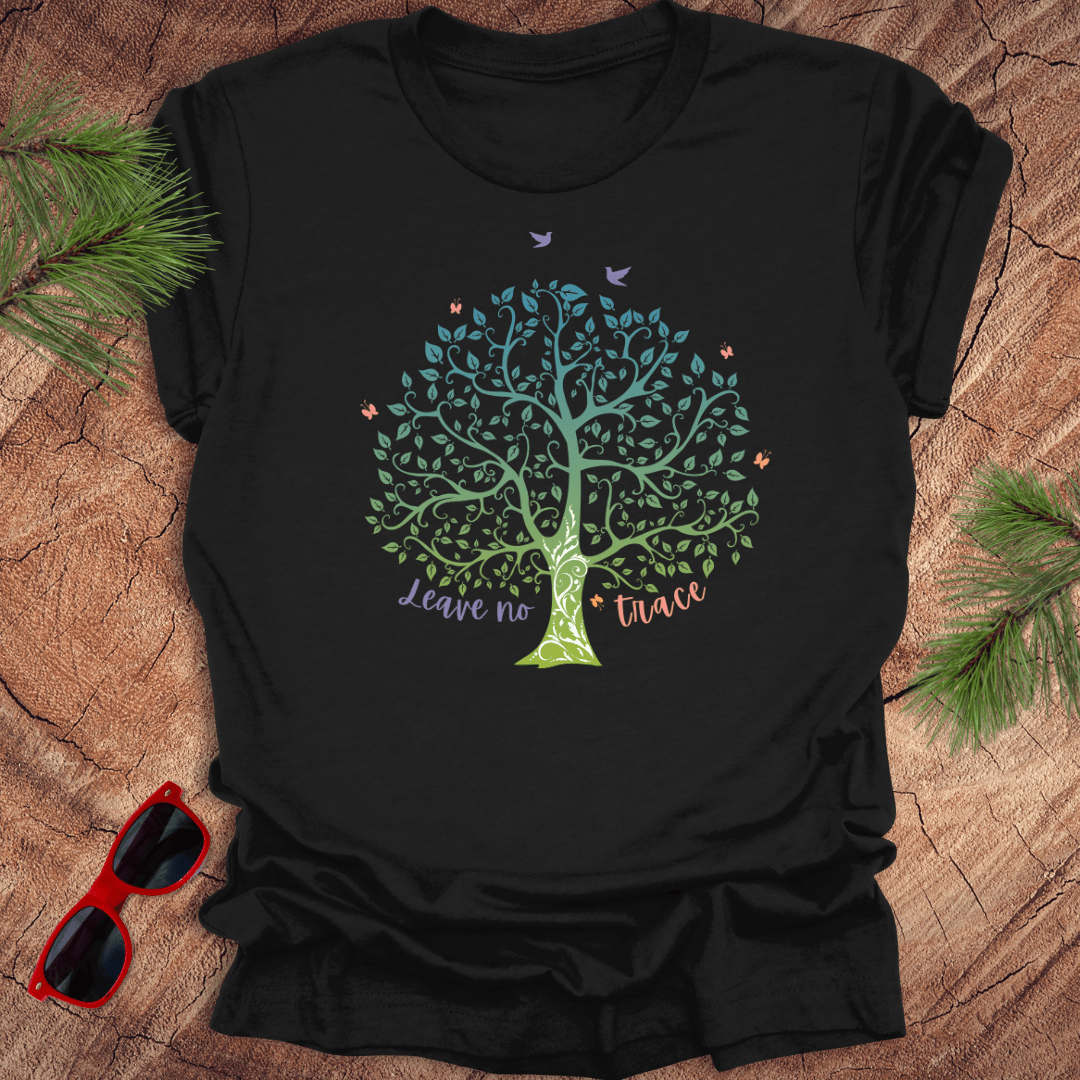 A black t-shirt with a graphic of a tree and the phrase 'Leave no Trace', surrounded by leaves and birds.