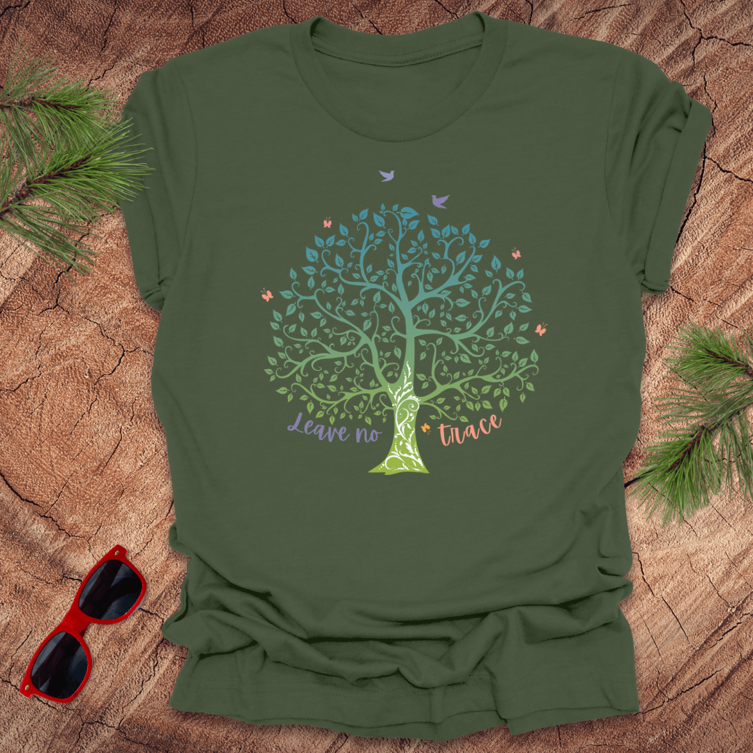 A green t-shirt with a graphic of a tree and the phrase 'Leave no Trace', surrounded by leaves and birds.