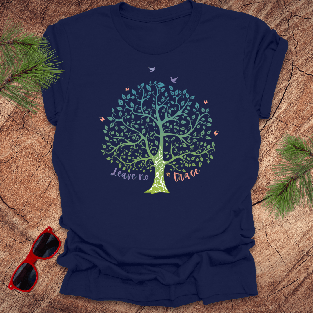 A navy blue t-shirt with a graphic of a tree and the phrase 'Leave no Trace', surrounded by leaves and birds.