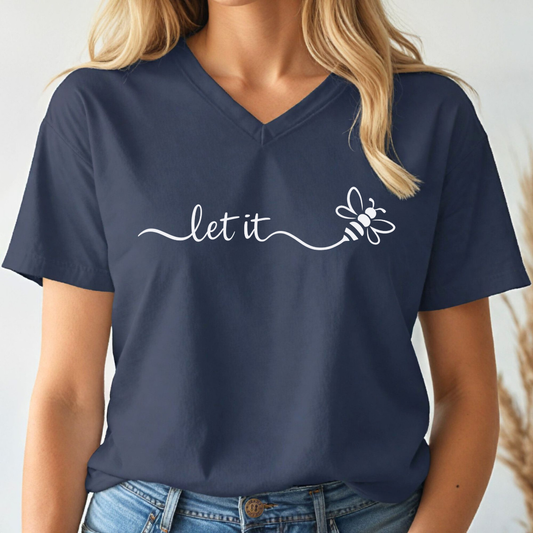 Navy blue  v-neck t-shirt with 'let it' and bee design worn by a person