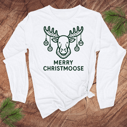 White long-sleeve shirt with a moose graphic and 'Merry Christmoose' text on a wooden surface.