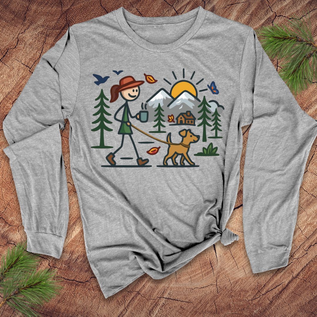 Gray long-sleeve shirt with a graphic of a person walking a dog in a forest on a wooden surface.