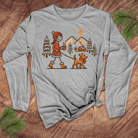 Gray long-sleeve shirt with a Christmas-themed graphic of a person walking a dog in the snow.