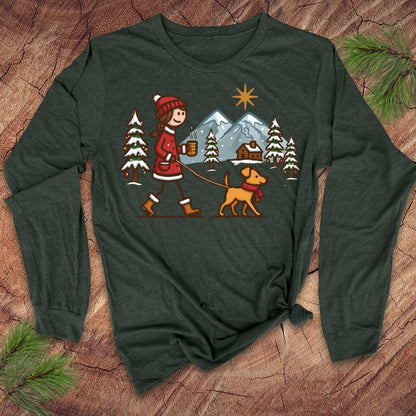 Green long-sleeve shirt with a winter scene design featuring a person and dog on a leash.