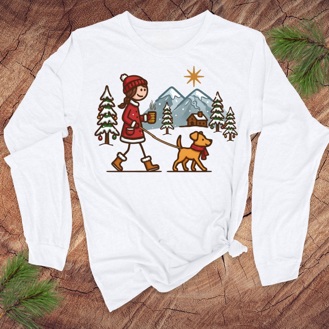 White long-sleeve shirt with a winter scene design featuring a person and dog on a leash.