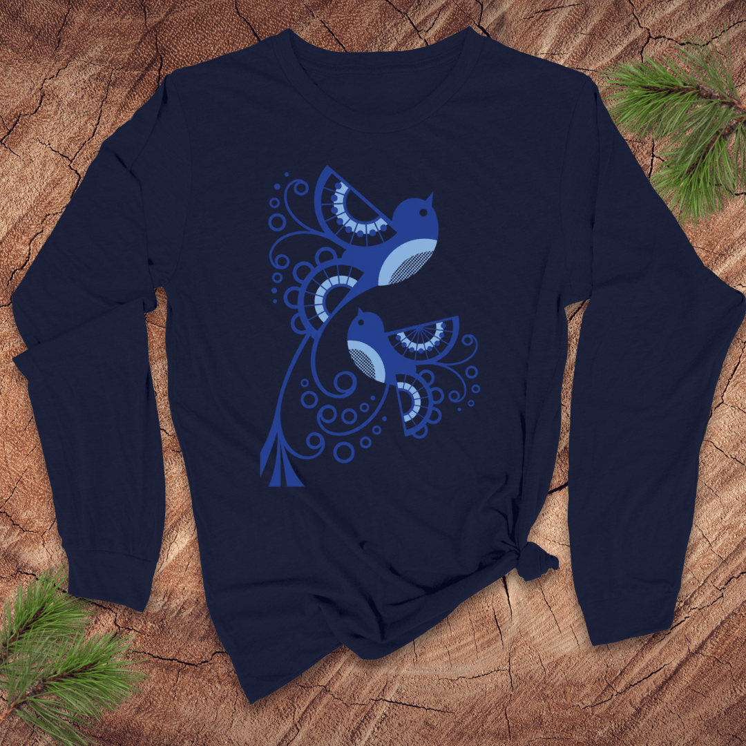 Navy blue long-sleeve shirt with abstract blue bird design on a wooden surface