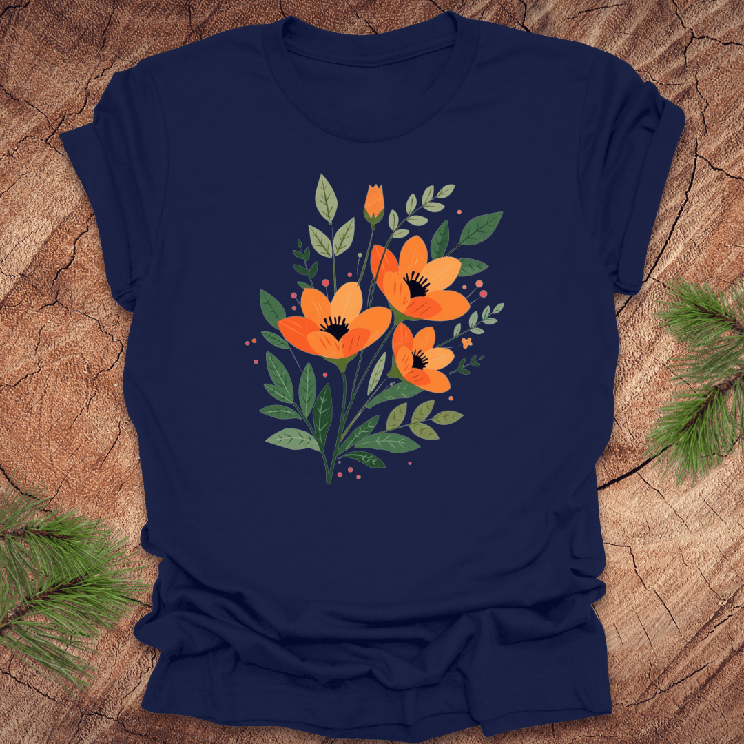 Navy blue t-shirt with orange floral design on a wooden surface