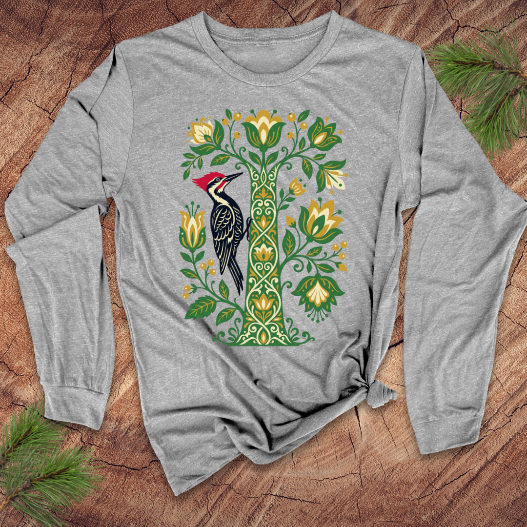 Gray long-sleeve shirt with a woodpecker and floral design on a wooden surface