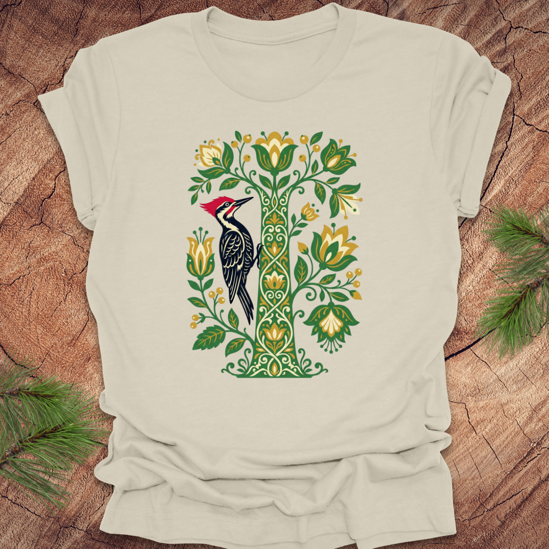 Beige t-shirt with a woodpecker design on a wooden surface