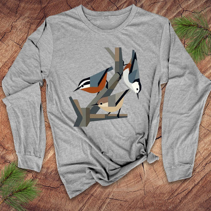 Gray long-sleeve shirt with nuthatch bird design on a wooden surface