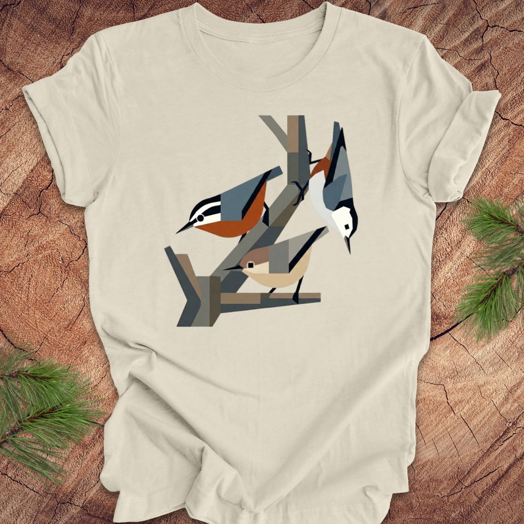 Beige t-shirt with nuthatch design on a wooden surface