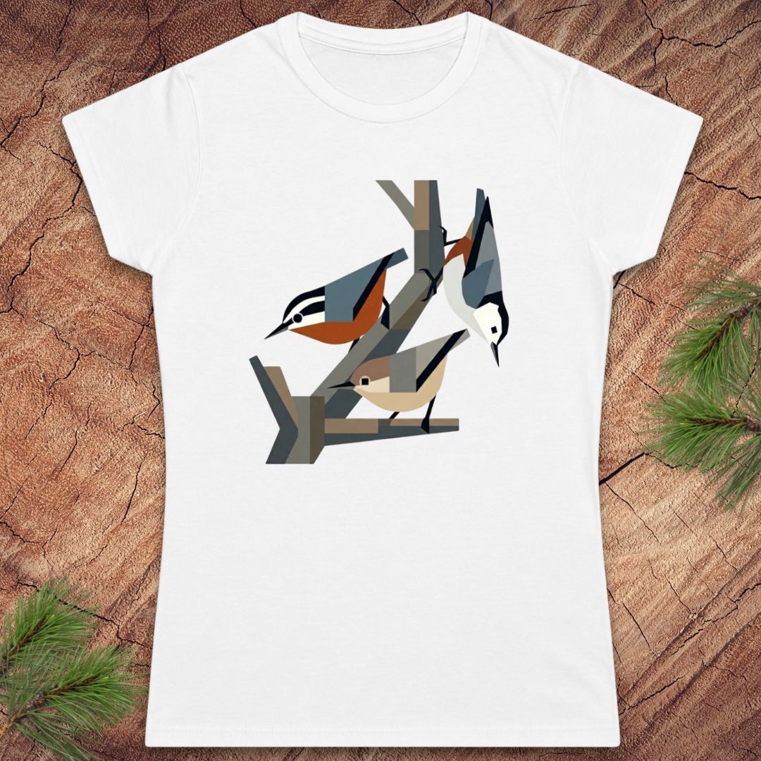 White t-shirt with nuthatch bird design on a wooden surface
