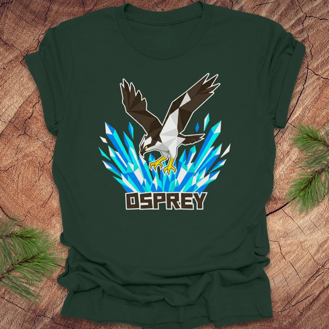 Green t-shirt with an osprey design on a wooden surface