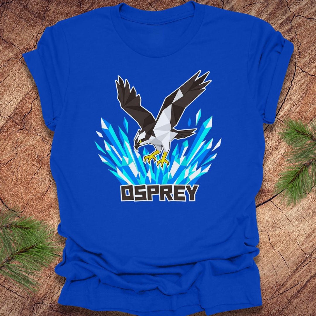 Royal blue t-shirt with an osprey graphic on a wooden surface