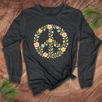 Dark gray long-sleeve shirt with a floral peace symbol design on a wooden surface.