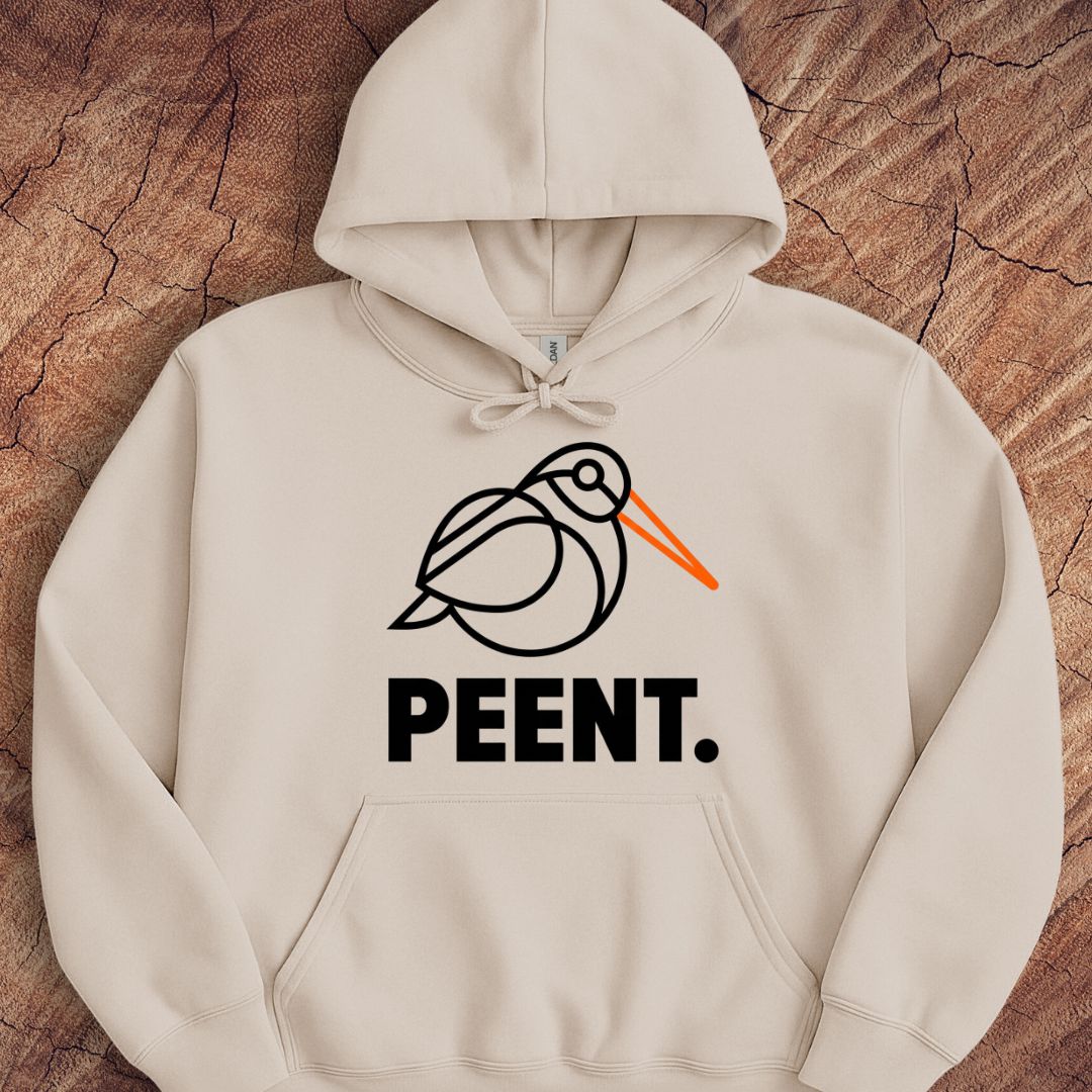 A cream-colored pullover hoodie with a graphic of a black and white bird with an orange beak, above the word 'PEENT.' in bold black letters.