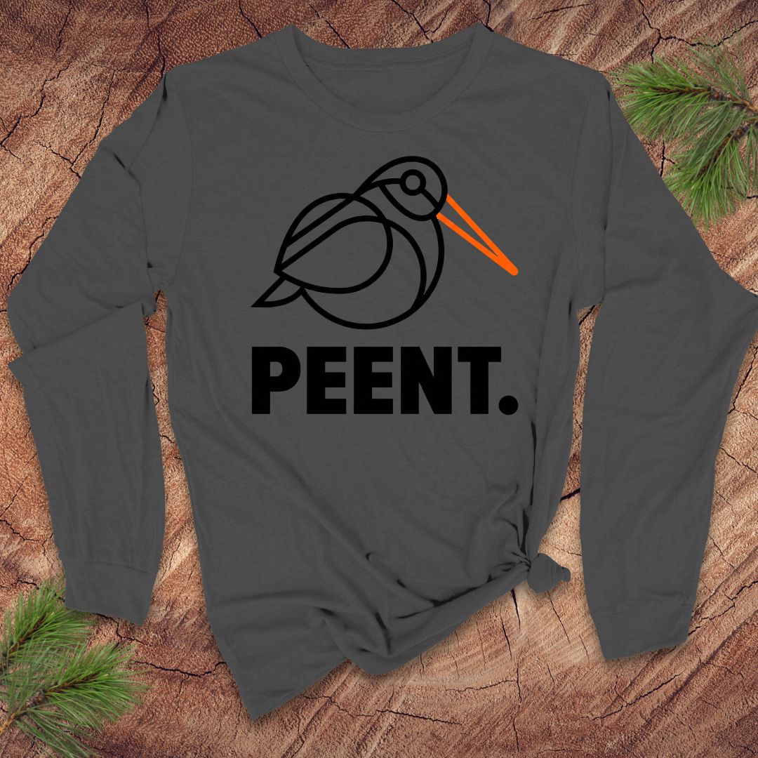Gray long-sleeve shirt with 'PEENT.' woodcock design on a wooden surface