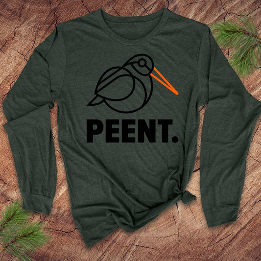 Green long-sleeve shirt with 'PEENT.' woodcock design on a wooden surface