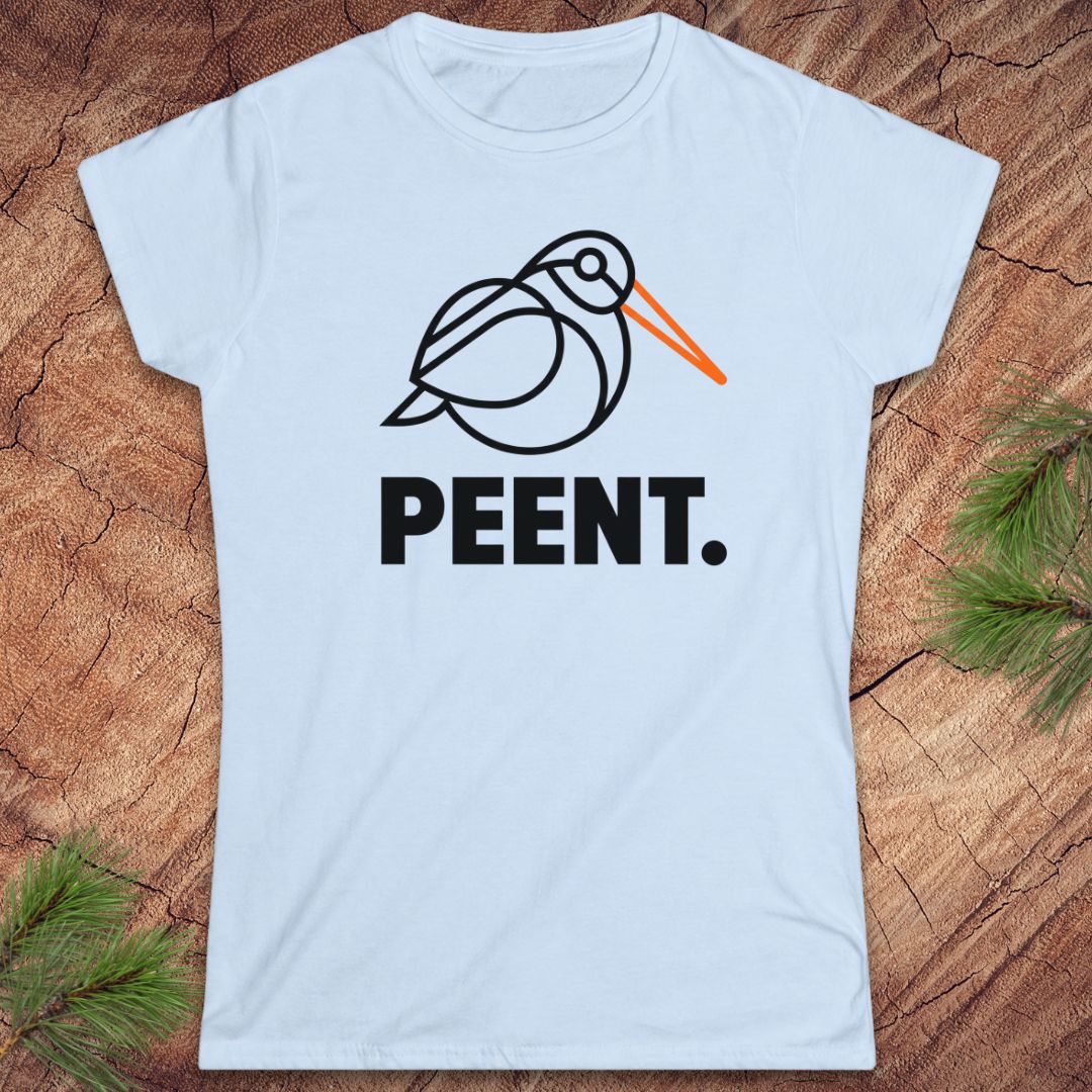 Light blue t-shirt with a woodcock graphic design and the word 'PEENT.' on a wooden surface.