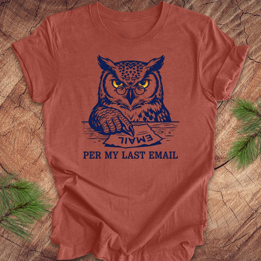 Clay colored t-shirt with an owl graphic and text, 'per my last email' on a wooden surface